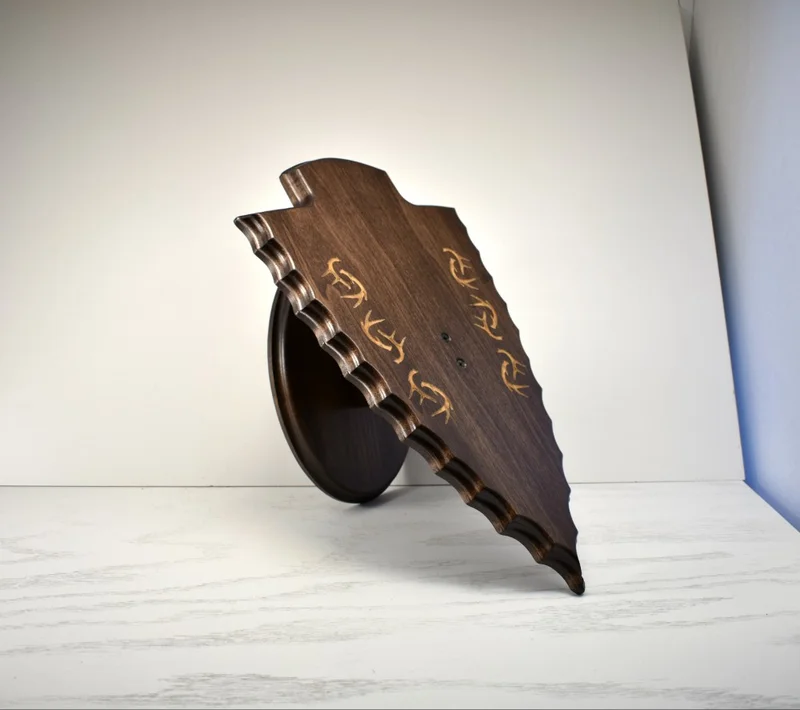 engraved arrowhead skull plaque