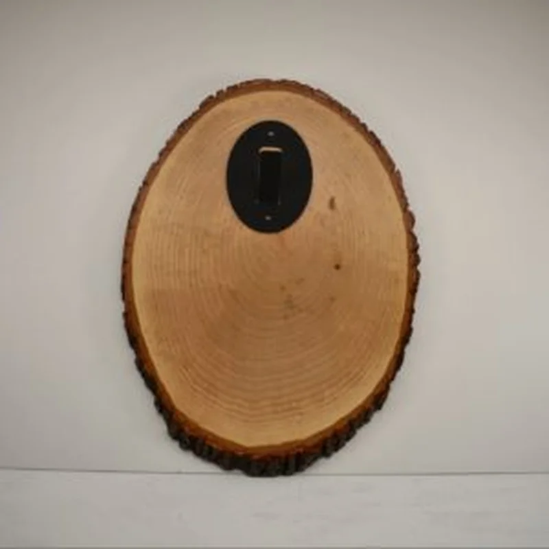 Bark Edge oval plaque with skull hanger.