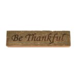 Reclaimed barn wood block sign that reads, "Be Thankful".