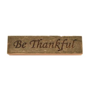 Reclaimed barn wood block sign that reads, "Be Thankful".