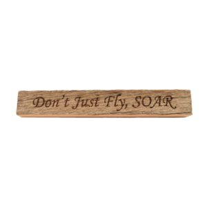 Reclaimed barn wood block sign that reads, "Don't Just Fly, SOAR".
