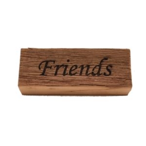 Reclaimed barnwood sign that reads, "Friends".