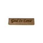 Reclaimed barnwood sign that reads, "God Is Love".