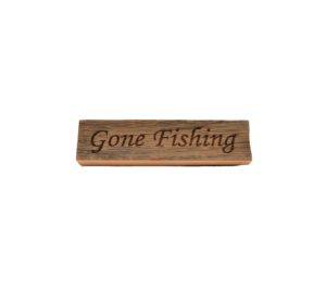 Reclaimed barnwood sign that reads, "Gone Fishing".