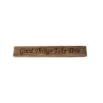 Reclaimed barn wood block sign that reads, "Good Things Take Time".