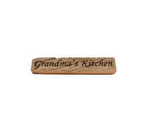 Reclaimed barn wood block sign that reads, "Grandma's Kitchen".