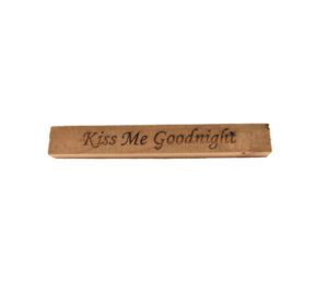 Reclaimed barn wood block sign that reads, "Kiss Me Goodnight".