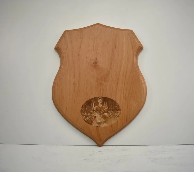 Shield antler taxidermy plaque with custom photo engraving on hardwood