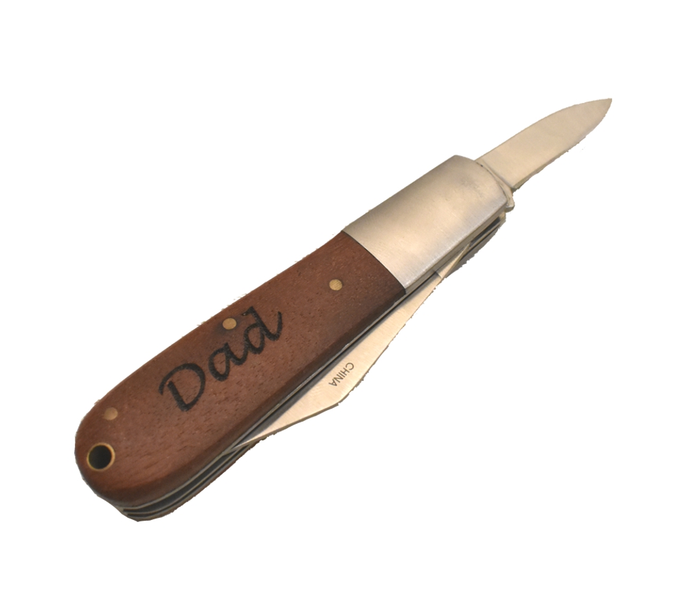 Barlow pocket knife engraved with the word, "Dad".