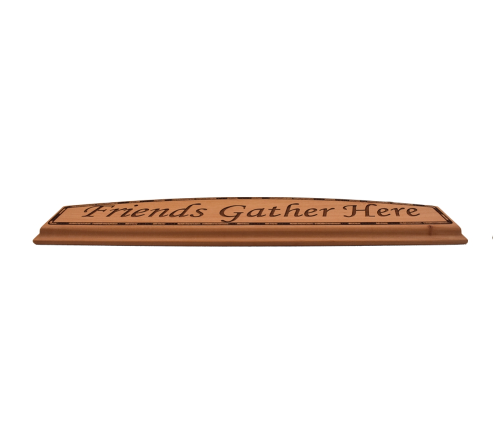Engraved hardwood door topper sign.