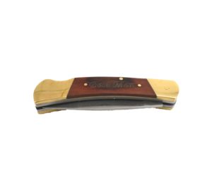 Lockback pocket knife engraved with the words, "Best Man".