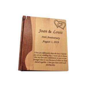 Personalized three ring wooden photo album.