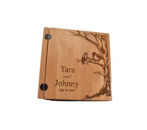Personalized three ring wooden photo album.