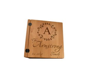 Personalized three ring wooden photo album.