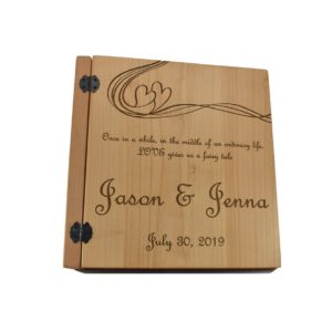Custom engraved three ring photo album.
