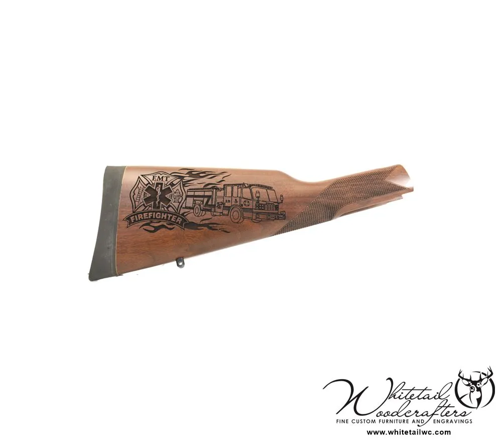 Close-up of custom gun engraving with fire department logo